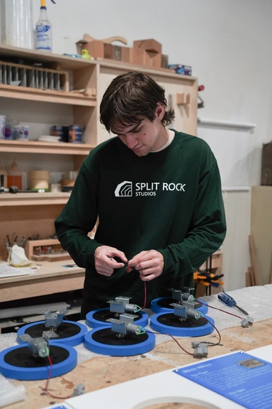 Sam Akerman working on projects