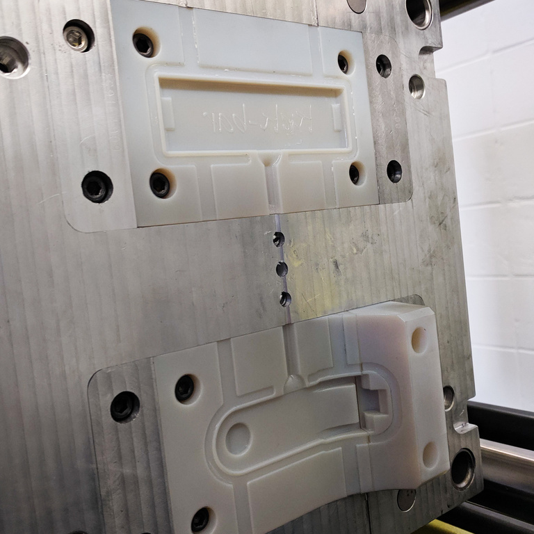 Kick-Bar Injection Mold